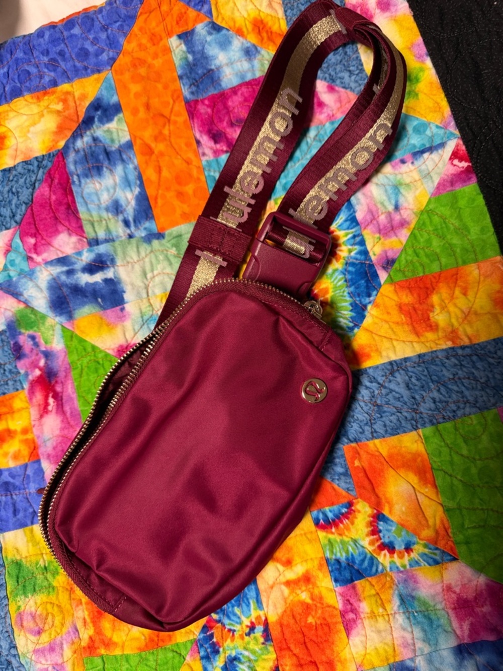 lululemon athletica Maroon Crossbody Sling with Gold Accent Strap